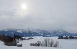 Foto: Tegelberg und Säuling in Schneewolken gehüllt