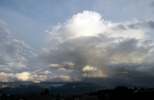 Foto: Congestus überm Tegelberg mit Schauer und Regenbogenfragment