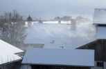 Foto: wirbelnder Schnee ber Dach
